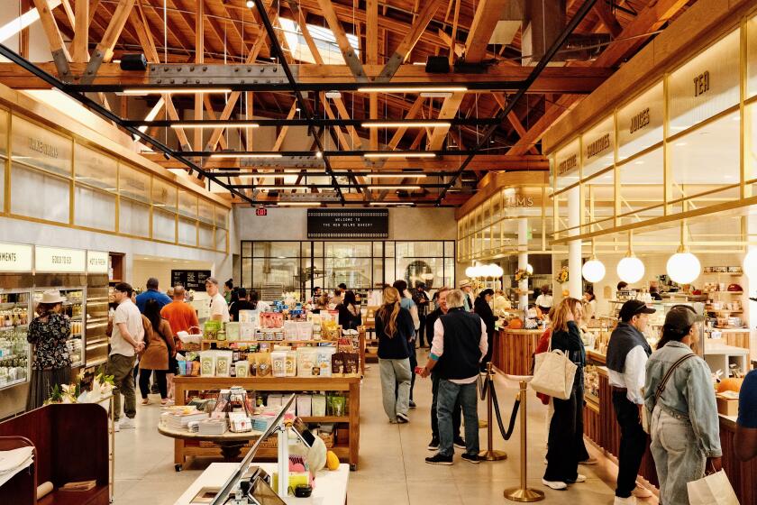 The new Helms Bakery in Culver City has a large marketplace in the center with prepared foods and snacks.