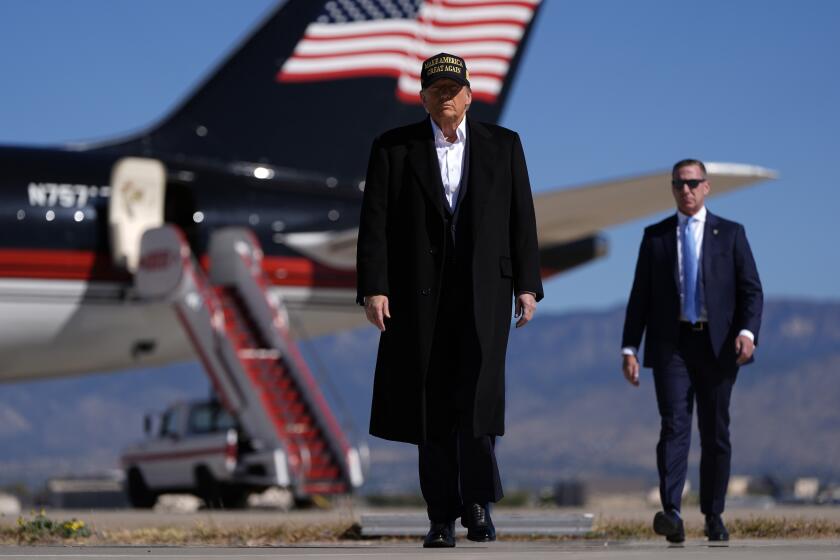 Republican presidential nominee former President Donald Trump arrives at a campaign rally at Albuquerque International Sunport, Thursday, Oct. 31, 2024, in Albuquerque, N.M. (AP Photo/Julia Demaree Nikhinson)