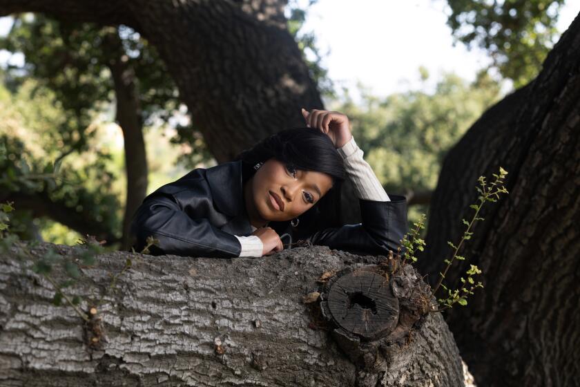 Keke Palmer poses for a portrait at her home