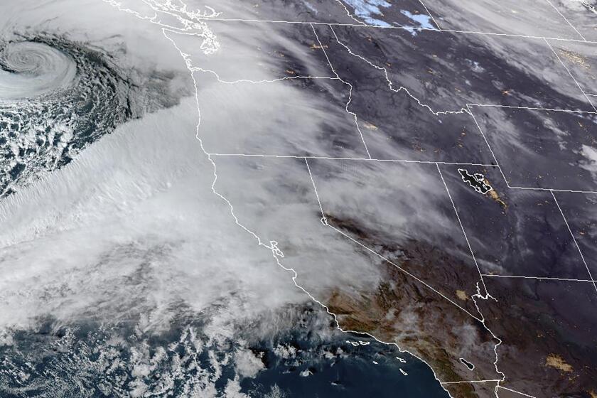 Satellite image provided by NOAA shows an atmospheric river moving in on Northern California.