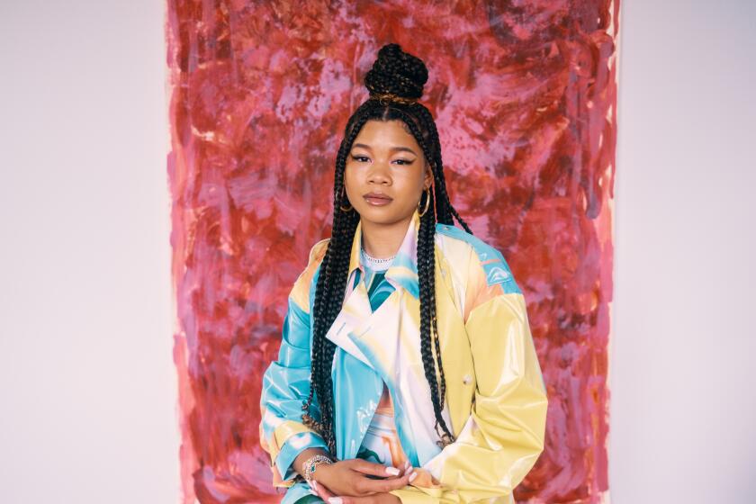 Storm Reid photographed in Beverly Hills in front of a red art piece