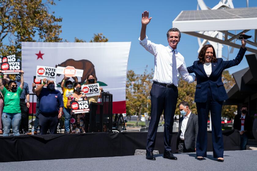 SAN LEANDRO, CA - SEPTEMBER 08: Vice President Kamala Harris joins California Governor Gavin Newsroom at a rally against the upcoming gubernatorial recall election at the IBEW-NECA Joint Apprenticeship Training Center on Wednesday, Sept. 8, 2021 in San Leandro, CA. The recall election, which will be held on September 14, 2021, asks voters to respond two questions: whether Newsom, a Democrat, should be recalled from the Office of Governor, and who would succeed Newsom should he be recalled. (Kent Nishimura / Los Angeles Times)