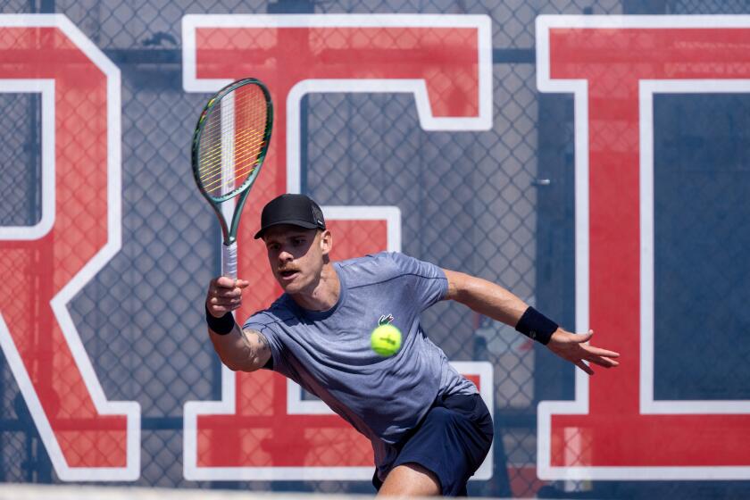 Redondo Beach, CA - September 17: Karue Sell hits a shot while training on the courts at Redondo Union High School on Tuesday, Sept. 17, 2024 in Redondo Beach, CA. (Brian van der Brug / Los Angeles Times)