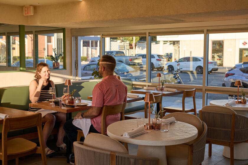 Long Beach , CA - October 23: A view of the interior dining space at Olive & Rose on Wednesday, Oct. 23, 2024 in Long Beach , CA. (Jennifer Chong / For The Times)