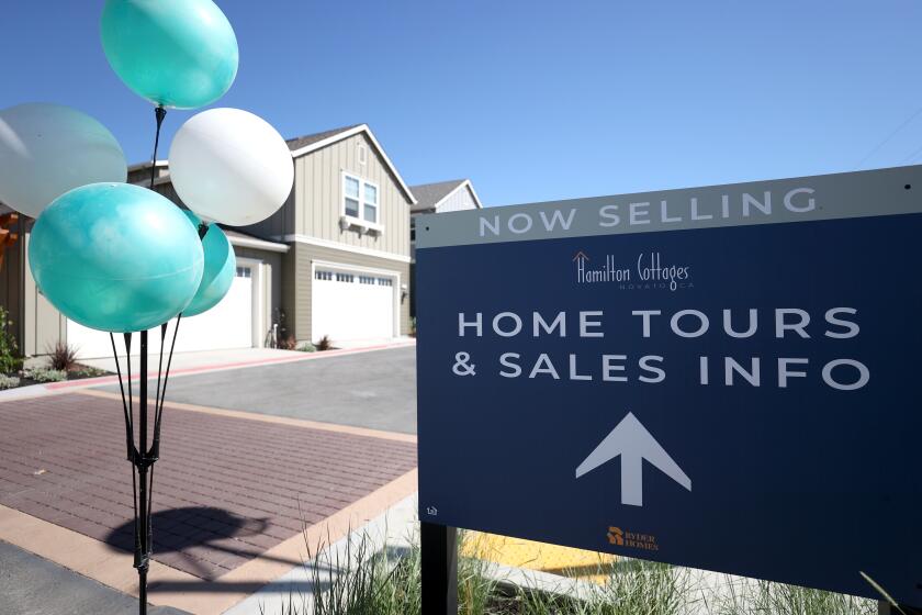 NOVATO, CALIFORNIA - SEPTEMBER 24: A sign is posted in front of new homes for sale at Hamilton Cottages on September 24, 2020 in Novato, California. Sales of new single-family homes rose 4.8 percent in August and surpassed an annual rate of 1 million for the first time in 14 years. (Photo by Justin Sullivan/Getty Images)