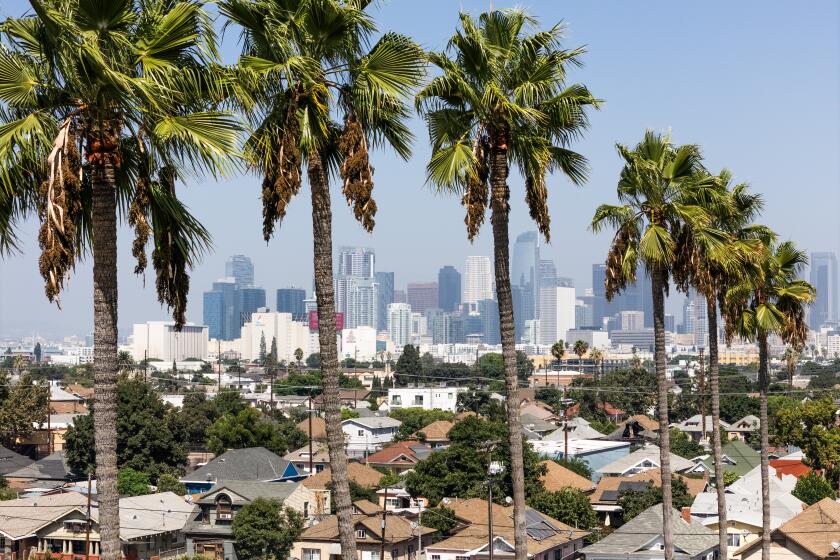 LOS ANGELES, CA - SEPTEMBER 26: Los Angeles is on the verge of redrafting blueprints for its neighborhoods to accommodate more than 250,000 new homes. But under a recommendation from the planning department, nearly three quarters of the city will remain off limits to further growth. Photographed at Historic South Central in Los Angeles, CA on Thursday, Sept. 26, 2024. (Myung J. Chun / Los Angeles Times)