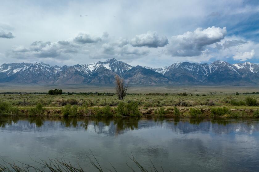 Lone Pine, CA - June 06: The Los Angeles Aqueduct flows south to the city through the Owens Valley on Tuesday, June 6, 2023 in Lone Pine, CA. (Brian van der Brug / Los Angeles Times)