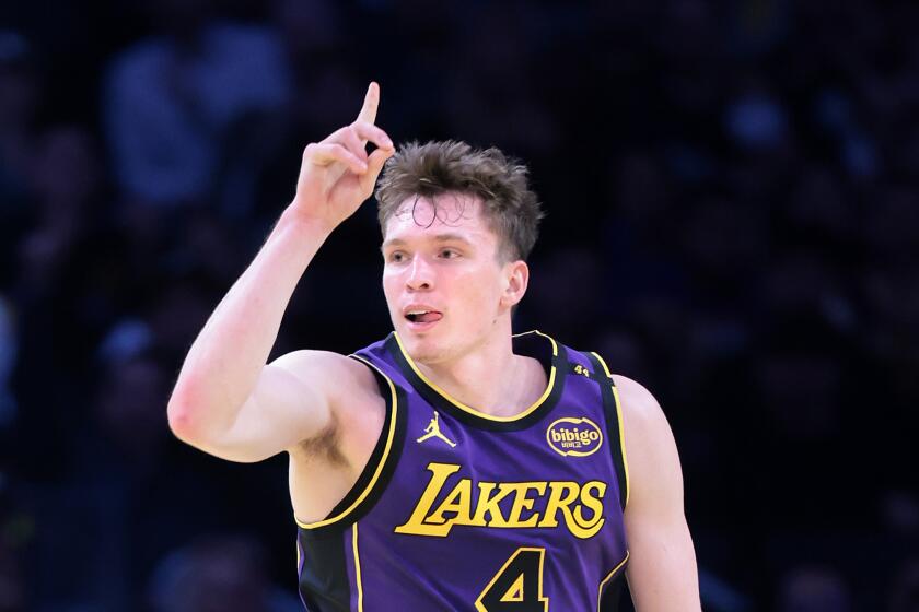 Laker Dalton Knecht celebrates after dunking during a win over the the Utah Jazz at Crypto.com Arena Tuesday. 