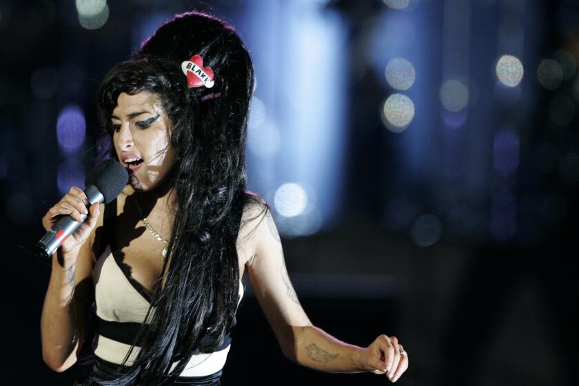 British singer Amy Winehouse performs at the 46664 charity concert in honor of Nelson Mandela's 90th birthday in 2008.