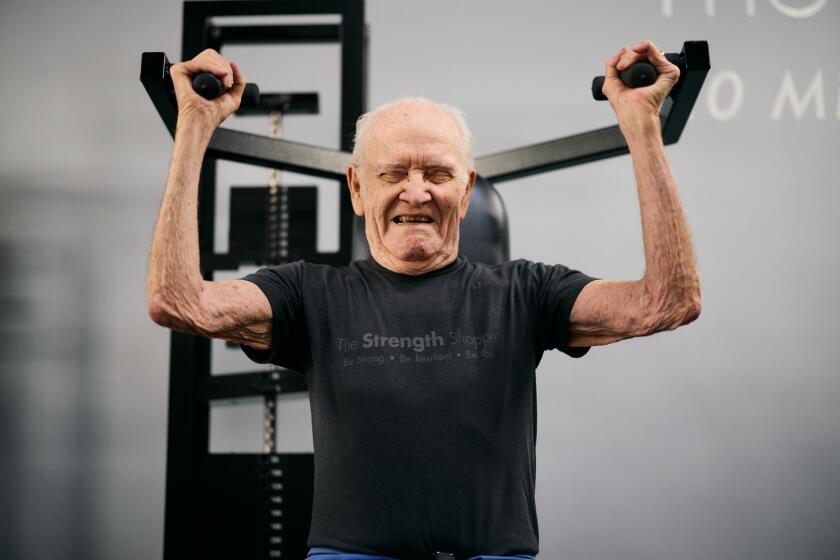 Los Angeles, CA - November 06:Inside the Strength Shoppe, clients in their 80s and 90s do slow motion strength training, lifting heavy weights very slowly. The Strength Shoppe on Wednesday, Nov. 6, 2024 in Los Angeles, CA. (Marcus Ubungen / Los Angeles Times)