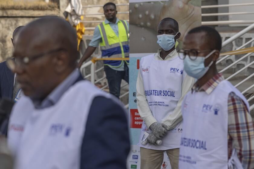 Health workers are photographed during mpox vaccination at the General hospital, in Goma, Democratic Republic of Congo Saturday, Oct. 5, 2024. (AP Photo/Moses Sawasawa)