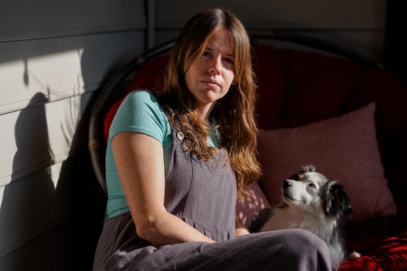 Rachael Dimond poses for a portrait on her apartment's balcony on June 4, 2024 in Atlanta, Georgia,