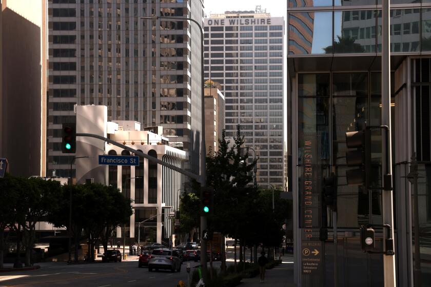 LOS ANGELES, CA - SEPTEMBER 26, 2024 OneWilshire high rise, center, used by data centers, is nestled between other buildings in downtown Los Angeles on September 26, 2024. (Genaro Molina / Los Angeles Times)