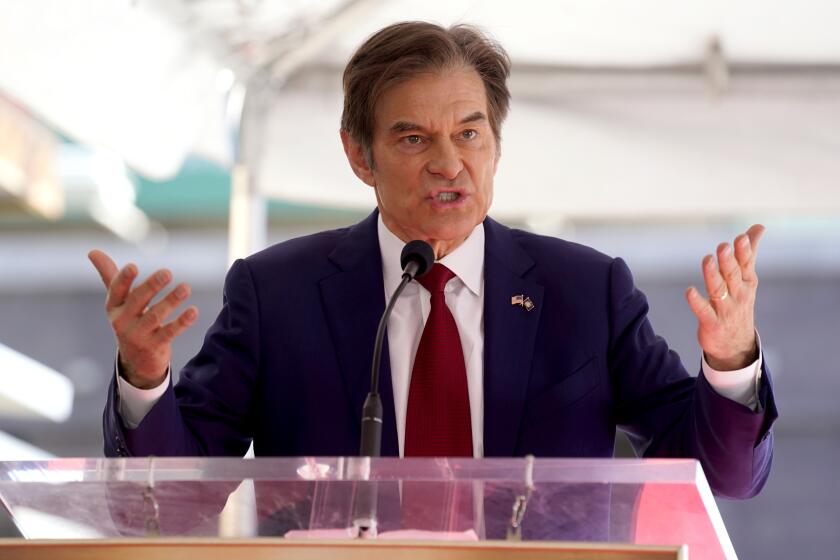 Mehmet Oz, the former host of "The Dr. Oz Show," speaks during a ceremony honoring him with a star on the Hollywood Walk of Fame on Friday, Feb. 11, 2022, in Los Angeles. (AP Photo/Chris Pizzello)