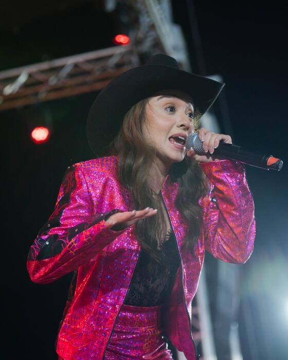 María Teresa Egunio from the Mexican Regional music duo Las Marias performs at Joe Orduño Park in San Luis, AZ.