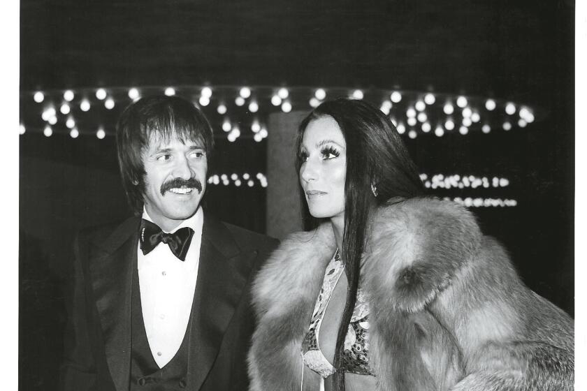 Cher and Sonny Bono at an award show